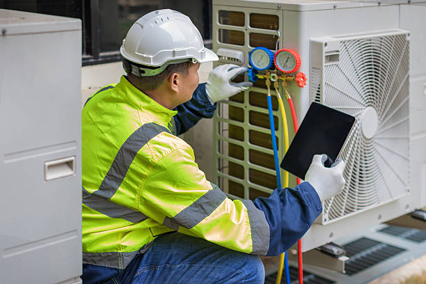 Professional Ac Installation technician working in Schwenksville, PA